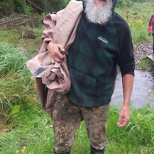 Mark Oster, ES Biodiversity Programme Leader, with the planting gear over his shoulder.