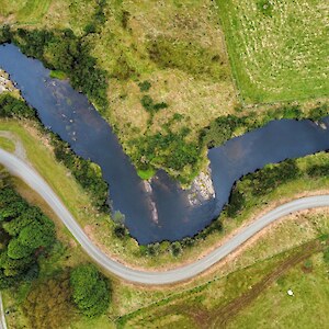 Drone view of the Waikawa River above Mānga Piri (Niagara Falls), a culturally significant site for kanakana (pouched lamprey). Photo: Robin Sallis.